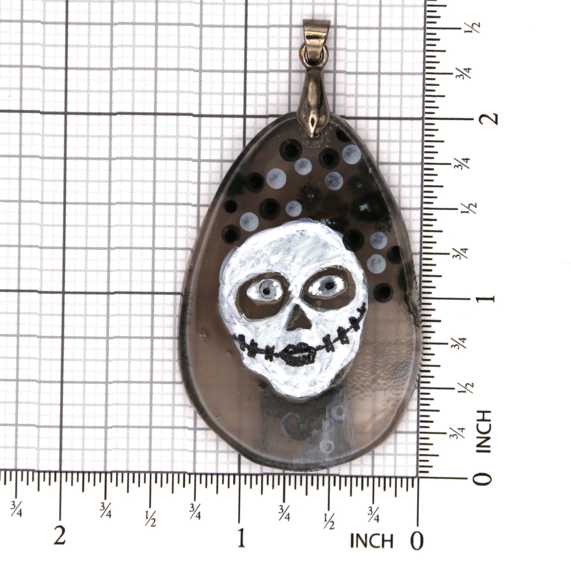 Pendant Size: 1.3 inches wide, 2 inches long, and 0.1476 inches thick.